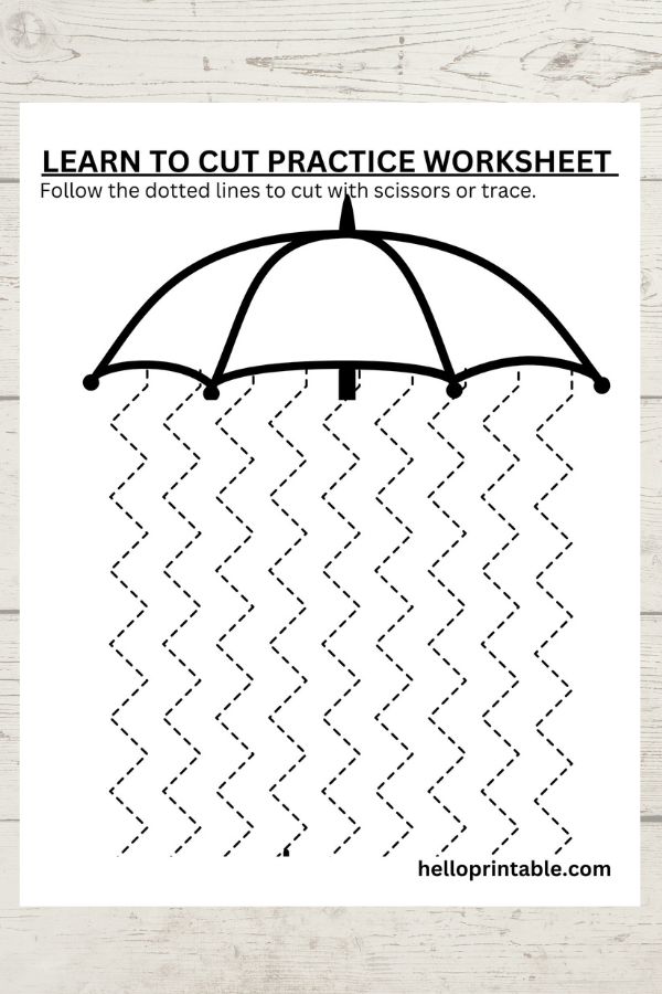 Umbrella themed sharp zig-zag lines cutting practice worksheets for preschool and kindergarten 